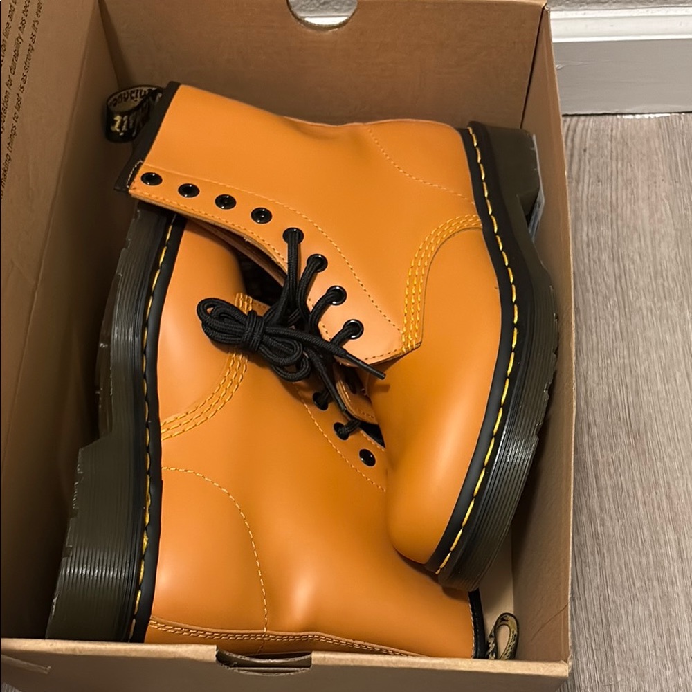 Dr. Martens Bright Orange Boots with Black Accents
